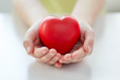 © Syda Productions - close up of child hands holding red heart