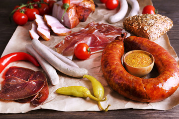 Poster - Assortment of deli meats on parchment, closeup