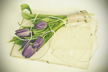 Old Love Letters And Purple Tulips