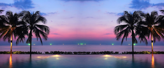 Wall Mural - sunset sea beach palms pool