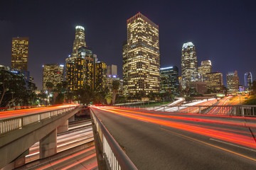 Poster - Los Angeles downtown buildings and highway traffic at night