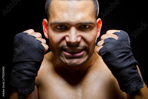 Fotografie, Obraz portrait of a latino mma fighter with intense expression
