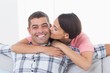 © WavebreakmediaMicro - Happy man being kissed by woman
