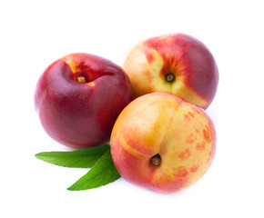 Poster - Ripe peaches with leaf isolated on white.