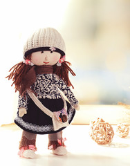 Wall Mural - Handmade doll near window close-up