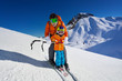 © Sergey Novikov - Father give mountain ski lesson to little boy