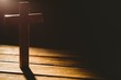 © WavebreakMediaMicro - Crucifix icon on wooden table