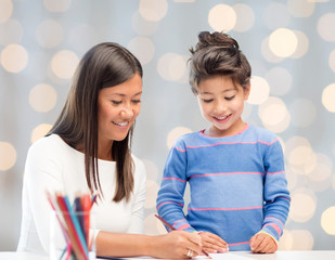 Poster - happy mother and daughter drawing with pencils