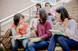 © Nonwarit - group of happy teen high school students outdoors