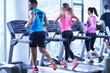 © .shock - Group of people running on treadmills