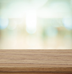 Empty table and blurred store with bokeh background