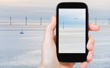 Poster - tourist shooting photo of Middelgrunden wind farm