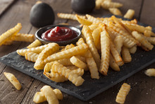 Unhealthy Baked Crinkle French Fries