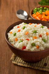 Sticker - bowl full of rice on wood