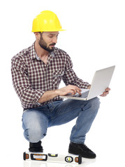 Canvas Print - Handyman with laptop