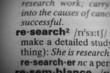 Definition of the word research, close up