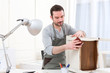 © Production Perig - Young attractive carpenter working in his workshop