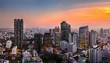 © anuchit2012 - Bangkok city sunlight warm orange panorama, dawntime sunrise in morning rooftop view, the office buildings in Bangkok city skyline top view business office in capital city of Thailand Asian