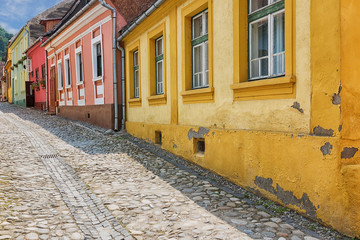 Sticker - Picturesque colourful street in Sighisoara, Romania.