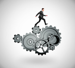 Wall Mural - businessman runs on gears