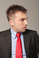 Poster - Side view picture of a young business man making