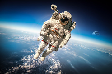 Wall Mural - astronaut in outer space