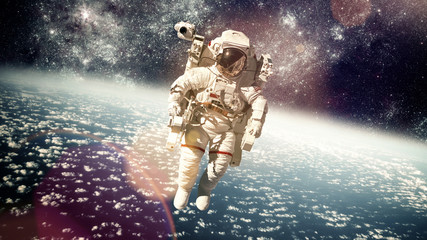 Wall Mural - astronaut in outer space