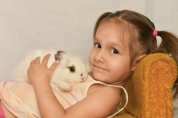 Wall Mural - Girl with a rabbit