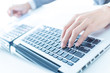 © Nonwarit - Closeup of businessman hands typing on laptop computer