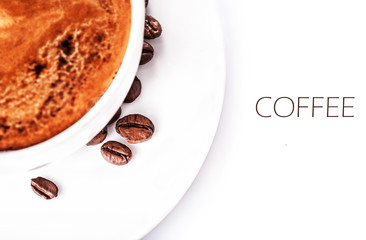 Poster - Coffee cup and roasted coffee beans isolated on a white backgrou