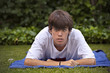 © fresnel6 - Teenager, with acne knocked down in the grass