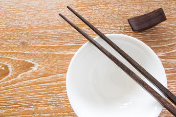 chopstick and bowl on table