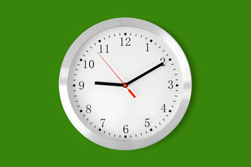 classic clock on green background