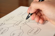 © Kyohei Kaneko - マインドマップを書いて企画書を準備する手　drawing a mindmap
