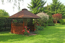 Wooden Summerhouse  In The Garden