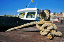 Boat Tied With A Rope On A Mooring