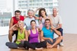 © WavebreakMediaMicro - Happy people in sportswear at fitness studio