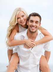 Poster - couple having fun on the beach