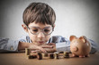 © olly - Child saving money