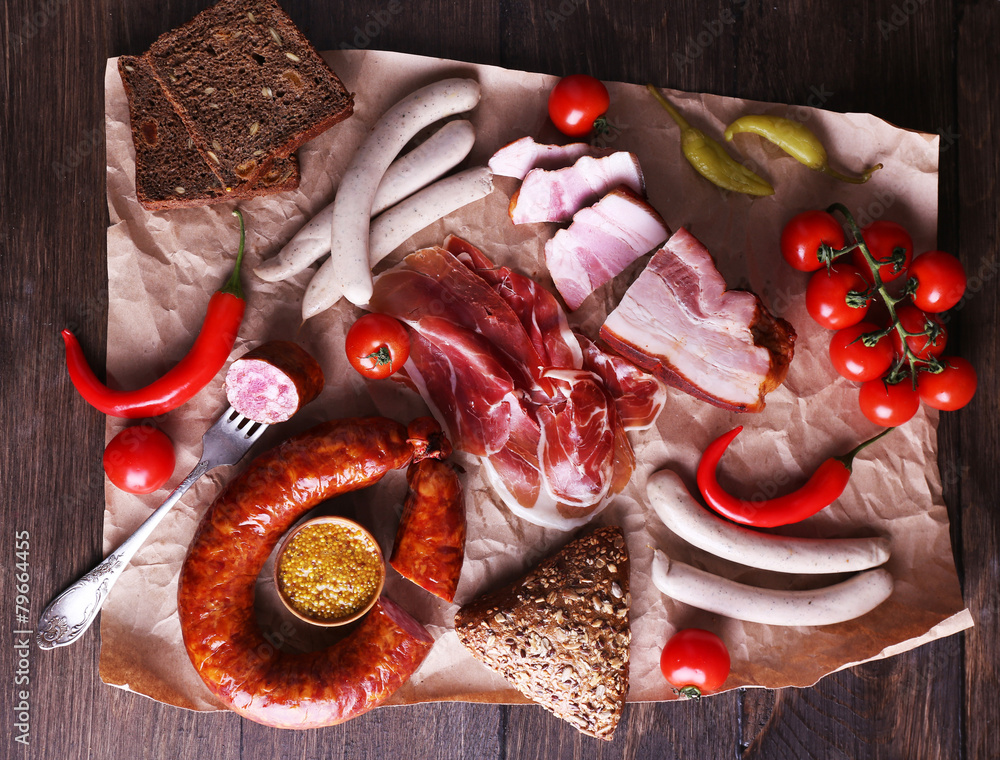 Assortment of deli meats on parchment, closeup