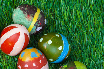 Happy easter eggs group on grass,can use as background for god f