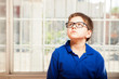 © AntonioDiaz - Cute kid looking up at home