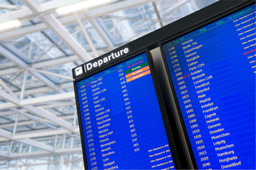 Fototapete - Flight, arrival and departure  board at the airport,