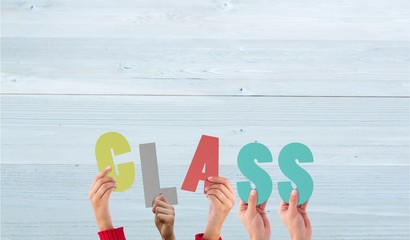 Poster - Composite image of hands holding up class