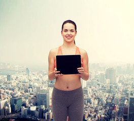 Poster - sporty woman with tablet pc blank screen