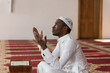 © Jale Ibrak - African Muslim Man Is Praying In The Mosque