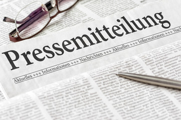 Wall Mural - Zeitung mit der Überschrift Pressemitteilung