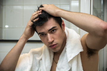 Wall Mural - Gorgeous Man after his Shower Holding his Head