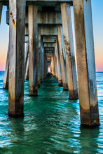 Underside Of Pier In Panama City Beach, Florida, At Sunrise