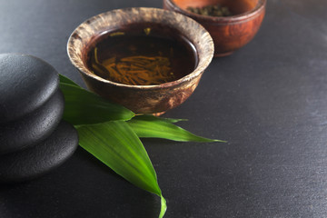 Wall Mural - Zen tea on black stone